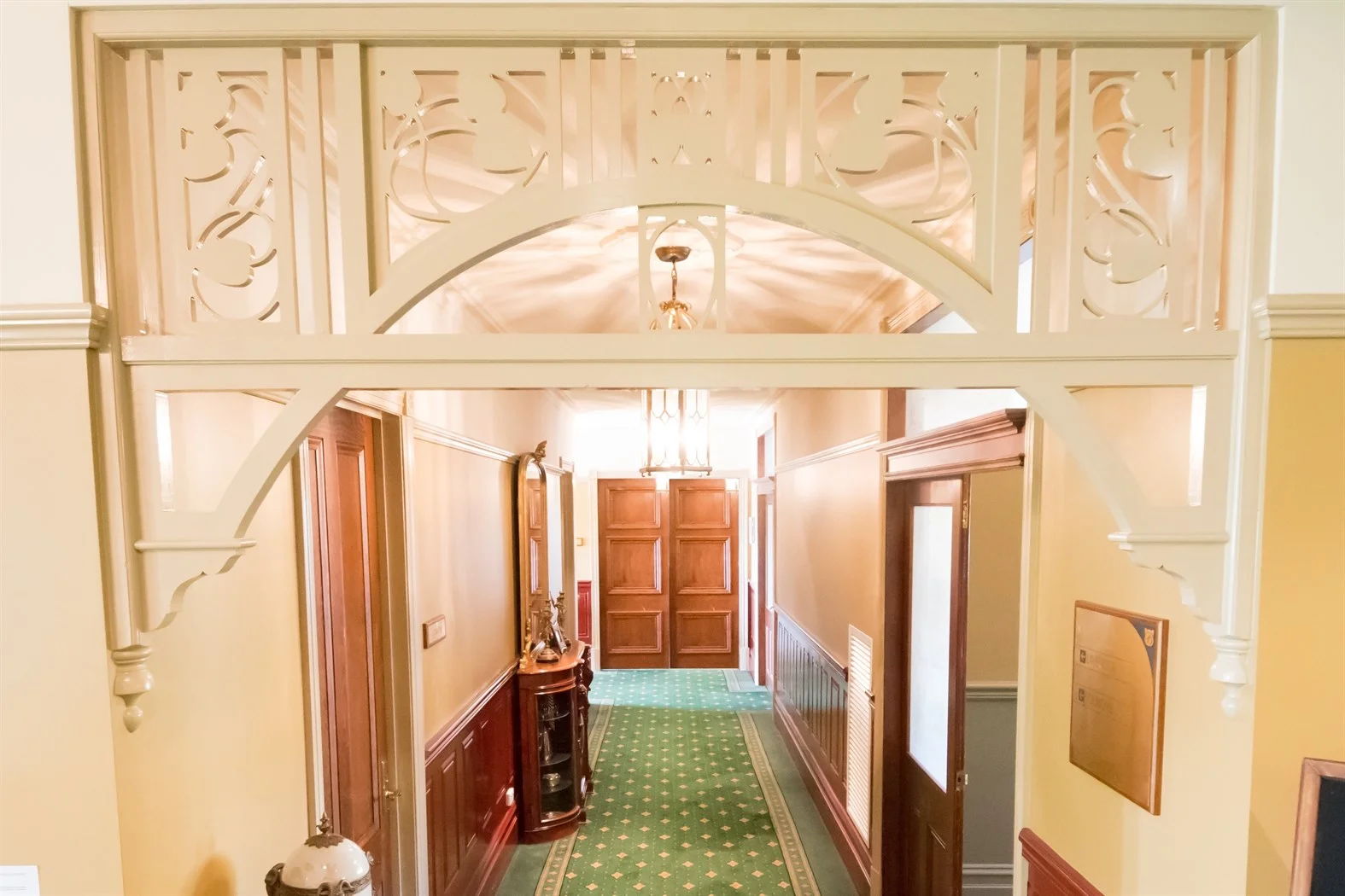 Painted internal fretwork spanning a heritage hallway