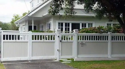 Smithton timber gate and matching fence run across a front boundary