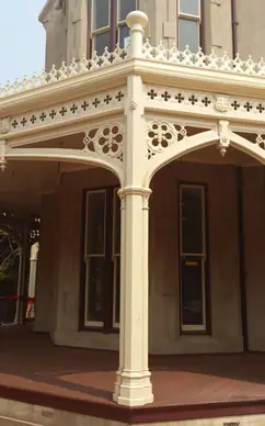 Turned verandah column and pierced fretwork frieze on a restored period verandah