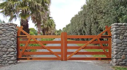 Timber gate JABIRO, installed on a front fence