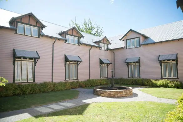 Timber window canopy - row of timber window canopies across a weatherboard elevation