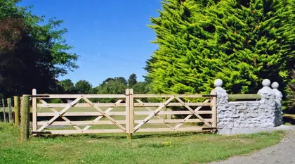 Timber gate LAURA, installed on a front fence