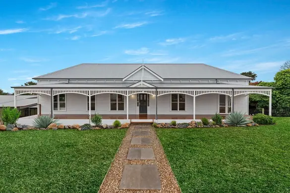 Turned timber verandah post V2, installed on a verandah, homestead with V2 posts