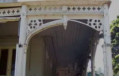 Made-to-order timber joinery - a weathered verandah before repainting, its original detail in place
