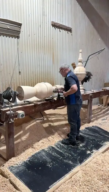 Heritage workshop - turner working at the lathe in the Heritage workshop