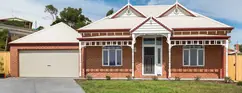 Made-to-order timber joinery, on a red brick facade