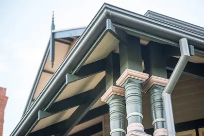 Turned timber gable finial, installed on a roofline