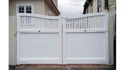 Parks timber gate, white gates with a pierced frieze on a brick drive
