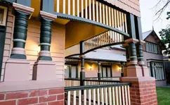 Made-to-order timber joinery, at dusk on a balcony
