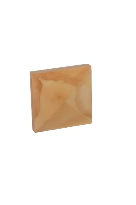 Architrave corner block, photographed against white