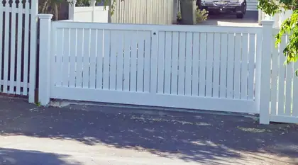 Timber gate COLER, installed on a front fence