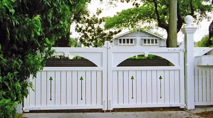 Timber gate PENOLA, installed on a front fence