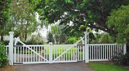 Timber gate JUNE, installed on a front fence
