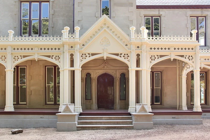Turned posts and decorative fretwork on a period verandah