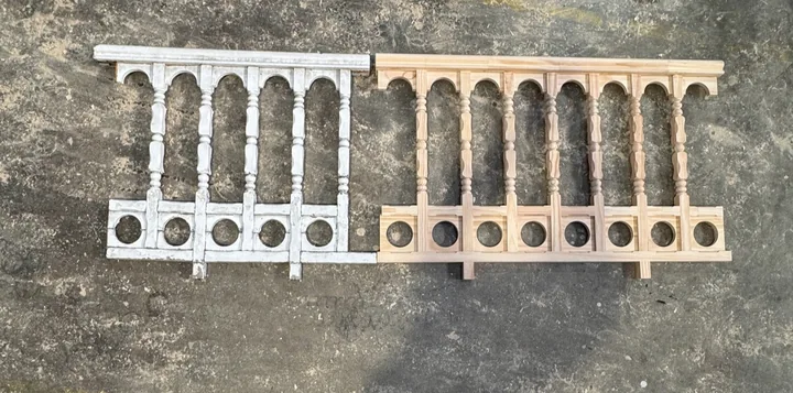 Painted turned fretwork sample beside a new timber panel with matching details