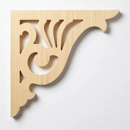 Photograph of a scrolled corner bracket. Trade code CB9.