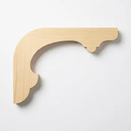 Photograph of a scrolled corner bracket. Trade code CB21.