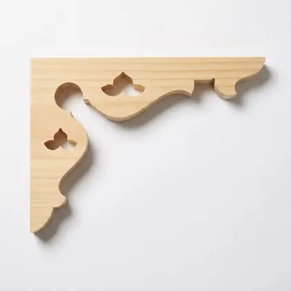 Photograph of a scrolled corner bracket. Trade code CB2.