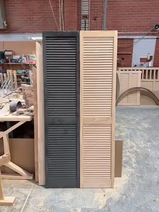 Photograph of a louvre door or shutter. Trade code WDSH.
