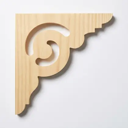 Photograph of a scrolled corner bracket. Trade code CB4.