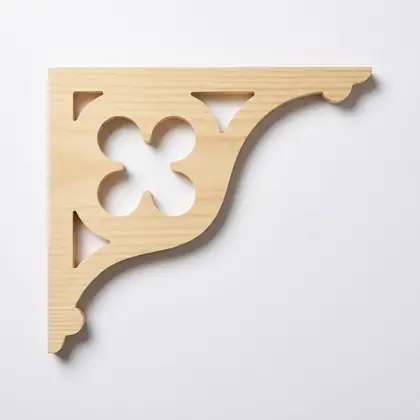 Photograph of a scrolled corner bracket. Trade code CB13.