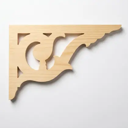 Photograph of a scrolled corner bracket. Trade code CB7.