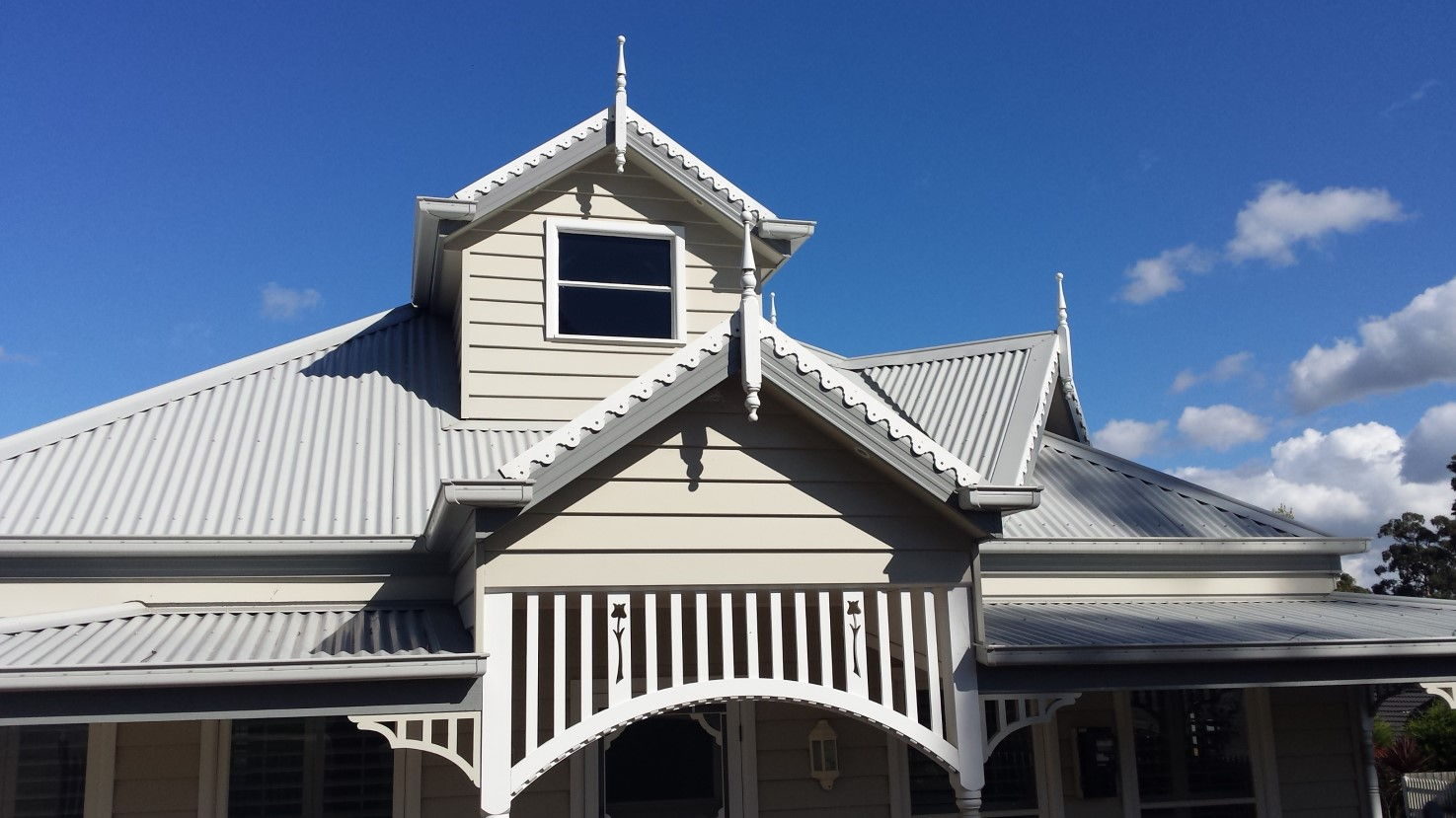 Timber gable infill - fretwork gable infill and finials on a Federation roofline