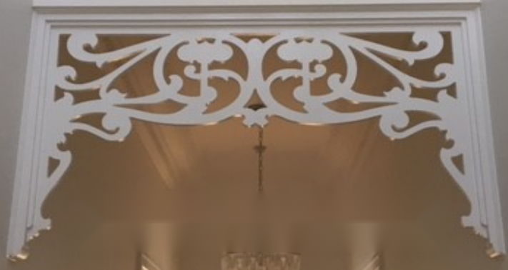 Decorative timber fretwork installed in an opening